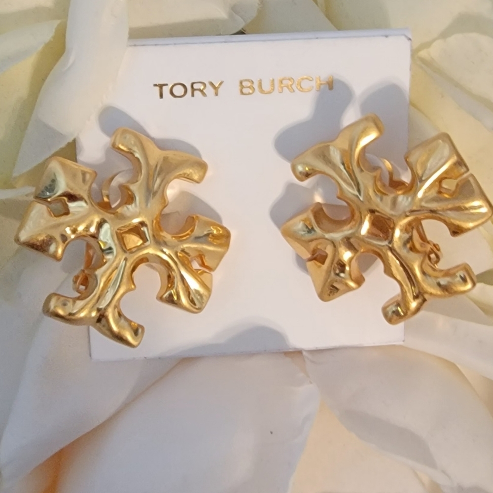 Tory Burch Big Roxanne clip earrings.